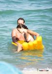 Stunning nudist women are swimming, enjoys their summer free time, and they're totally topless 2