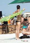 She goes into the water and flaunts her perfect, large ass and seductive curves 4