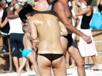 She goes into the water and flaunts her perfect, large ass and seductive curves 4