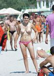 She goes into the water and flaunts her perfect, large ass and seductive curves 4