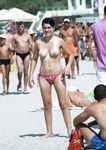 She goes into the water and flaunts her perfect, large ass and seductive curves 4
