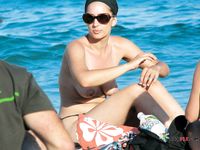 She loves showing off her sensual curves, tiny breasts, and trimmed pussy 4