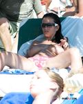 Naked beach sounds like a perfect place to be for these two hot, slim chicks as they topless enjoy the sun and lure the views of the passing bys 2