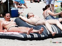 Nudist babe with plump boobs looks around while being recorded, and she's clueless about it 2