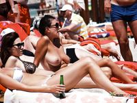 Nudist babe with plump boobs looks around while being recorded, and she's clueless about it 2