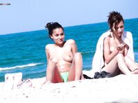 The feeling of complete freedom during a topless afternoon by the waves.