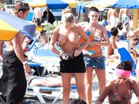 . A refreshing sea breeze meeting the warmth of bare skin on a quiet, sandy waterfront.