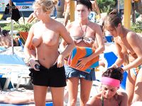. A refreshing sea breeze meeting the warmth of bare skin on a quiet, sandy waterfront.