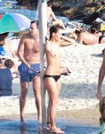 Embracing the natural human form at a stunning, clothing-optional bay.