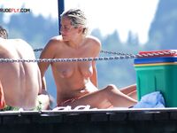 . Artful photography of a lady enjoying the liberation of a clothes-free vacation.