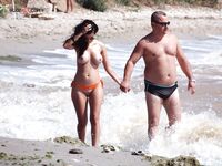A quiet afternoon on the shore, focused on the peacefulness of being topless.