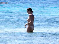 A peaceful retreat to a cove where the only clothing is the sea spray.