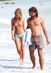 The perfect tan: capturing a woman enjoying the sun without any restrictions.