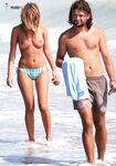 The perfect tan: capturing a woman enjoying the sun without any restrictions.