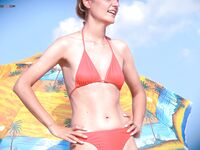 The aesthetic of a natural body soaking up the warmth of a sunny day.