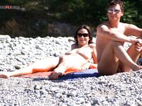 A collection of candid moments at a beach where being topless is the tradition.