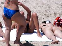 Capturing the authentic, natural beauty of a woman at a topless beach. 2