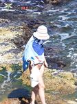 Embracing the cooling sea water on bare skin at a secluded, clothing-free shoreline. 2