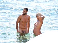 This cute italian woman was displaying her body in a spanish nude strand. Viva italia!.