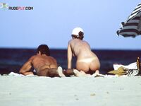 Atmospheric imagery of a woman finding her peace at a hidden, clothing-optional cove.