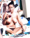 Ocean Waves Rolling Past a Topless Beach Walk