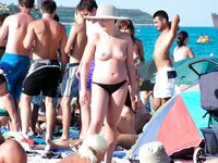 Embracing the warmth of the sun in a state of total nudity.