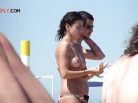 Some interesting beach scenes in a barcelona, spain, naturist beach.