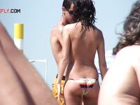 Some interesting beach scenes in a barcelona, spain, naturist beach.