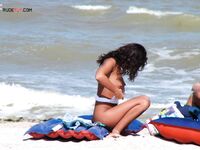Sunbathing on a Red and Blue Air Mattress at a Nude Beach