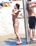Capturing the independent spirit of a woman who loves the nude beach.