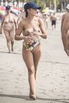 Walking Across a Nude Beach with a Clear Handbag