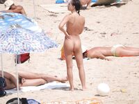 Ready for Volleyball Near a White Ball on the Sand