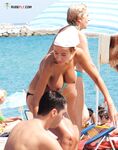 Capturing the graceful silhouette of a sun-worshipper at a local naturist-friendly bay.