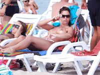 She is the hottest babe on the strand, what a body. Her body is heaven.