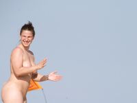 Beach Volleyball Court Stroll with Nudists and Sunbathers