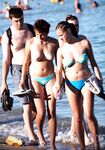 The beauty of bare skin and the vast ocean at a naturist-friendly shore. 2