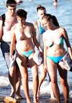 The beauty of bare skin and the vast ocean at a naturist-friendly shore. 2