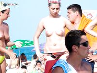 Posing with confidence in a state of total freedom and nudity.