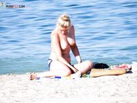 Warm Sunlight on Bare Skin During a Sandy Beach Afternoon