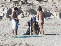 Despite cloudy weather and few people on the beach, my wife decided to have a little fun!.