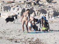Despite cloudy weather and few people on the beach, my wife decided to have a little fun!.