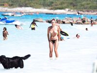 Capturing the spirit of a woman who loves the freedom of the nude beach.