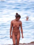 The joy of a topless afternoon spent with friends by the ocean.