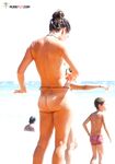 A collection of candid moments at a beach where being topless is the norm. 2