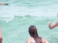 A Headfirst Dive Into the Waves in Pink Bikini Bottoms