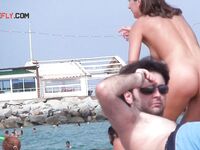 A Headfirst Dive Into the Waves in Pink Bikini Bottoms