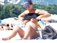 Capturing the graceful beauty of a woman at a quiet, nude coastal spot. 3