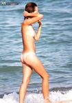 Wet Skin and Slow Steps from the Sea onto Nudist Sand