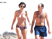 Colorful Headscarf on a Sandy Nude Beach Walk by the Waves