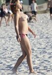 Embracing the natural human form at a stunning, clothing-optional bay. 4